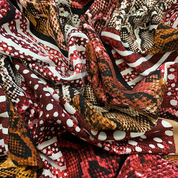 Red and Black Multi Animal Patchwork Print Rayon Challis Fabric