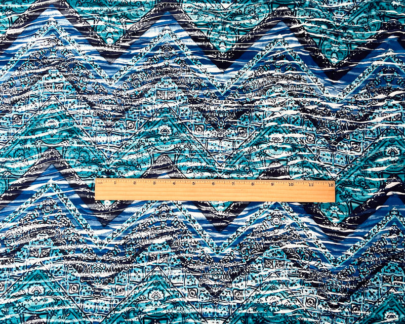 Blue-Turquoise Poly Chevron Baroque Print Knife Pleat Knit Fabric