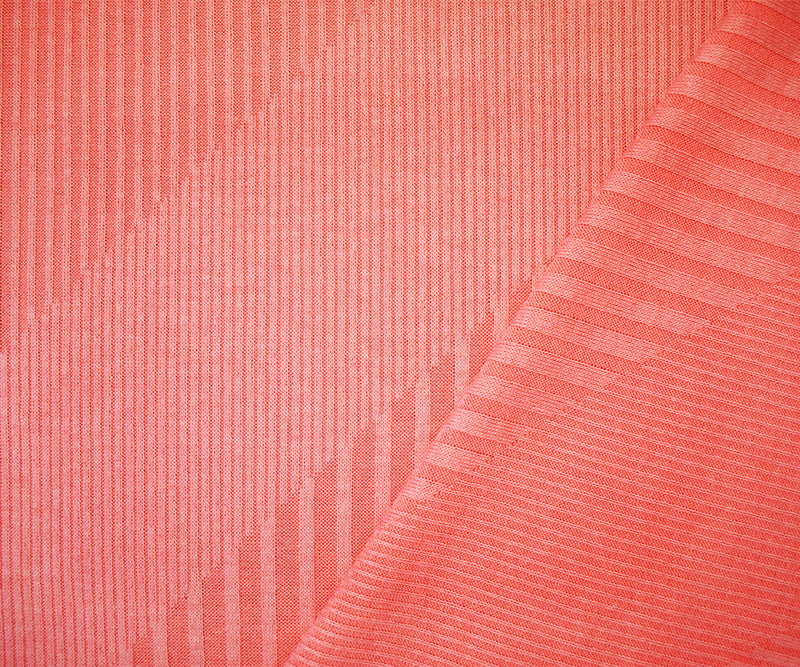 Coral Pink Poly Blend Stretch Irregular Rib Knit Fabric