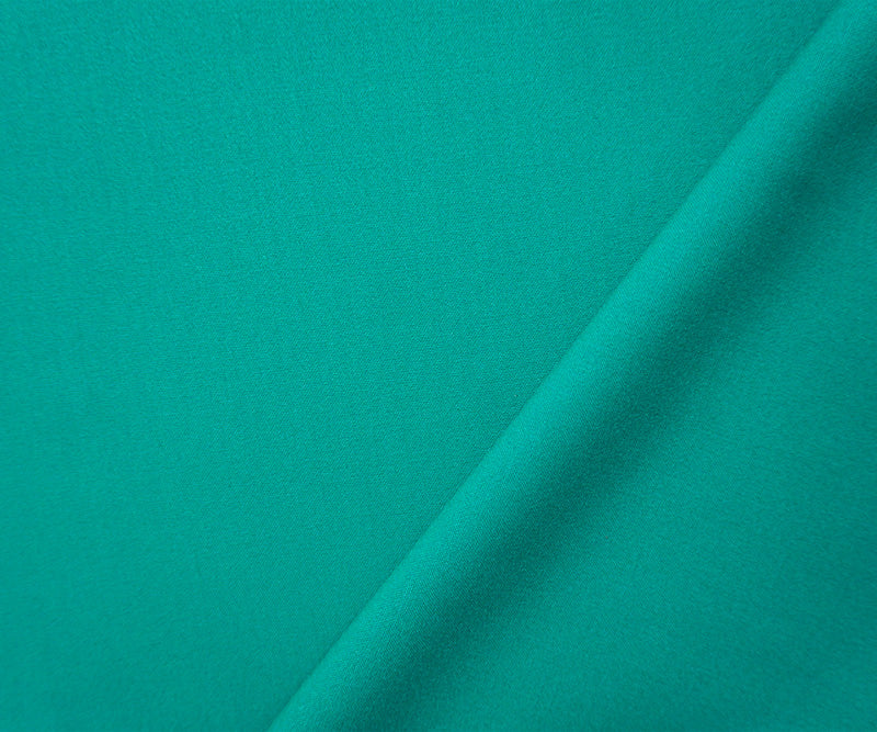 Turquoise Poly Rayon Spandex Stretch Solid Woven Suiting Fabric