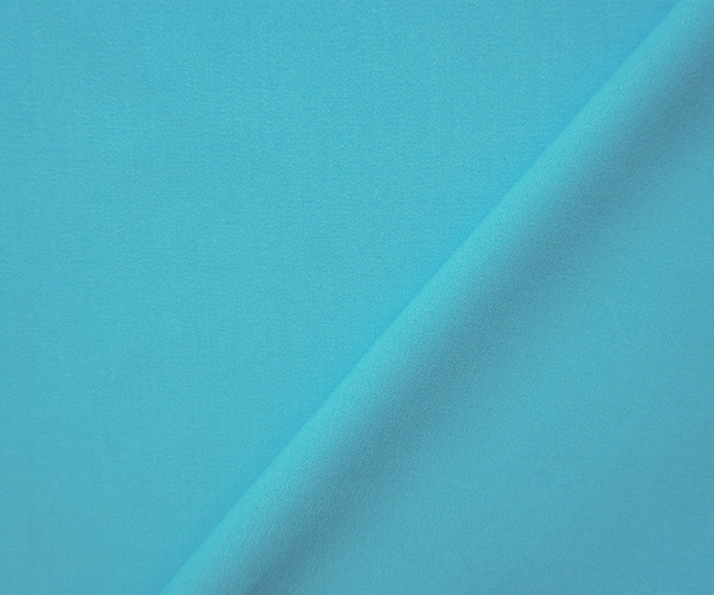 Blue Poly Rayon Spandex Stretch Solid Woven Suiting Fabric