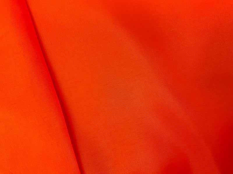 Bright Neon Orange Poly China Silk Solid Lining Woven Fabric