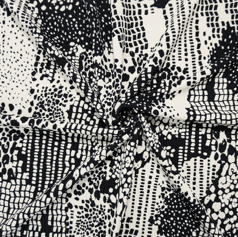 Black-White Poly Abstract Printed Liverpool Double Knit Fabric