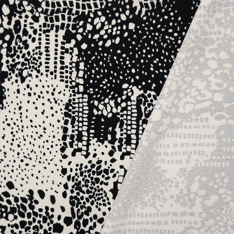 Black-White Poly Abstract Printed Liverpool Double Knit Fabric
