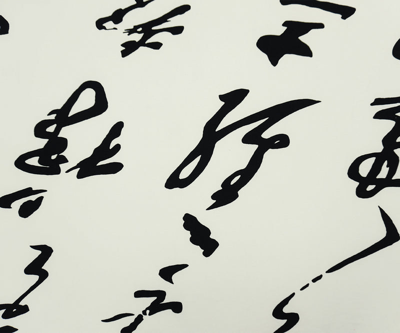 Off-White-Black Poly Calligraphy Printed ITY Jersey Knit Fabric