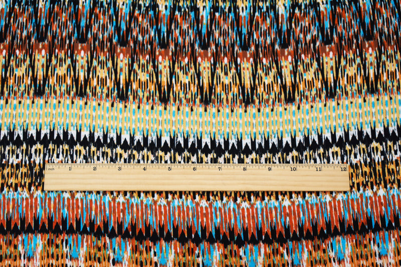 Orange-Turquoise-Multi Poly Aztec Ikat Printed Pebble Crepe Woven Fabric