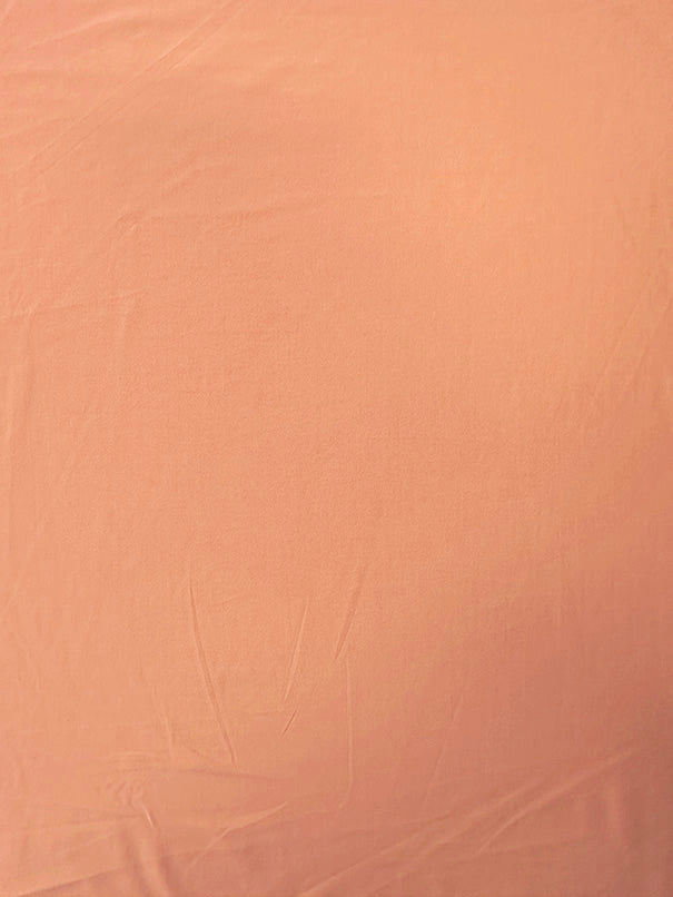 Peach Solid ITY Jersey Knit Fabric