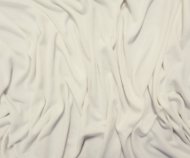 Ivory Poly Blend Solid Jersey Sweater Knit Fabric